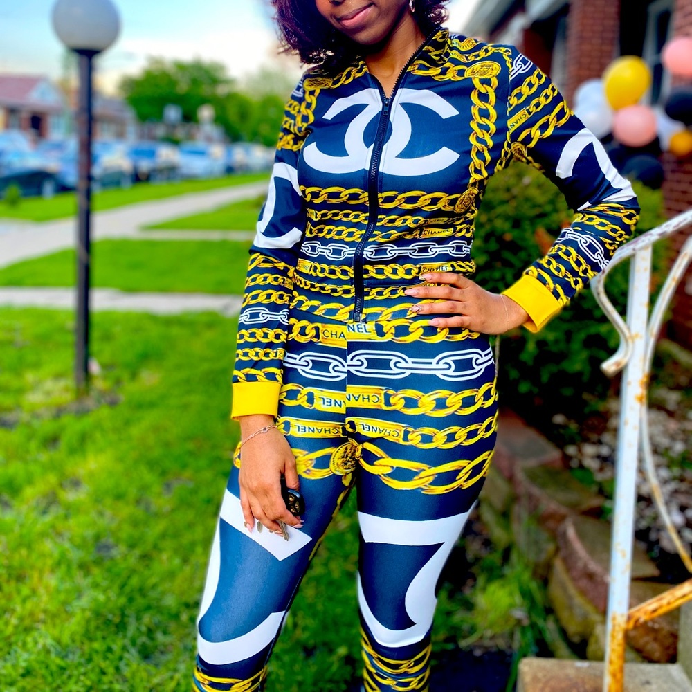 Small custom made gold, white, and black two piece